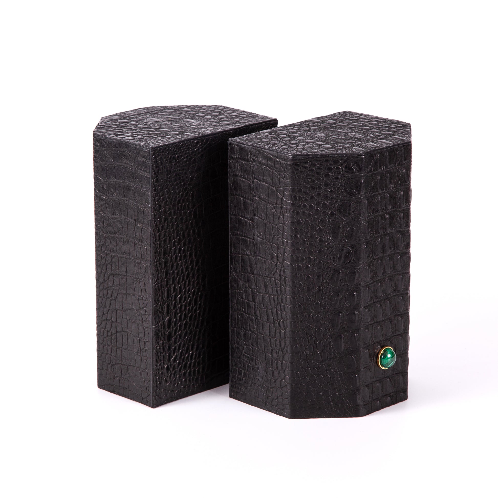 Croco bookends to add style and exotica to any library. Solid geometric blocks of wood covered in leather are the essential jewels on a bookshelf. %100 Leather (Embossed Croco) Jeweled with natural malachite stones