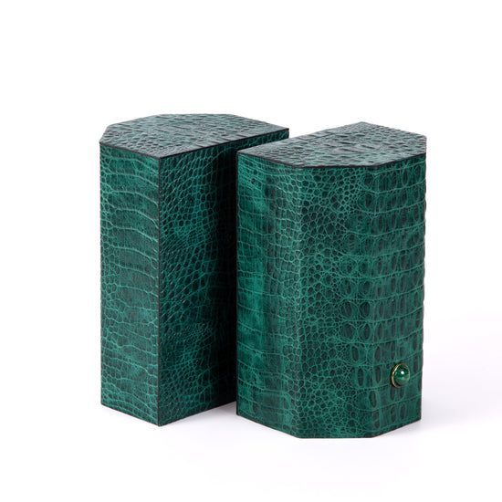 Croco bookends to add style and exotica to any library. Solid geometric blocks of wood covered in leather are the essential jewels on a bookshelf. %100 Leather (Embossed Croco) Jeweled with natural malachite stones
