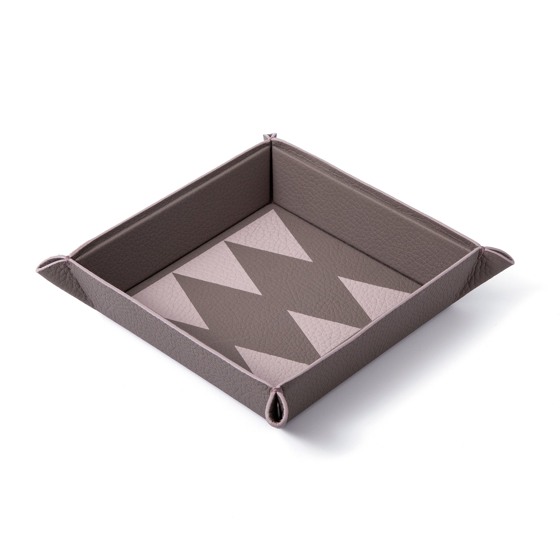 Vide poche trays meant to lighten up your load, and give you joy wherever you choose to place them. 100% Leather