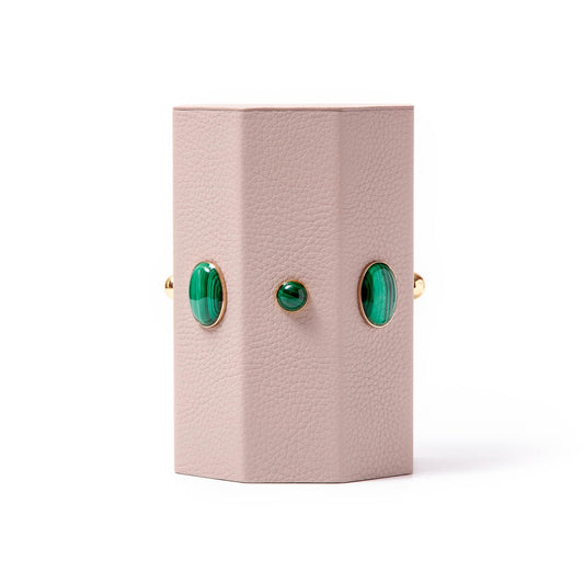 Madame Malachite A powerful protection stone, Black Onyx absorbs and transforms negative energy, wherever you may choose to keep it. Timeless and tasteful bookends jeweled with natural stones to increase the energy in you home. Perfect decorative pieces for for your cabinet of curiosities. %100 Leather (Floater leather)