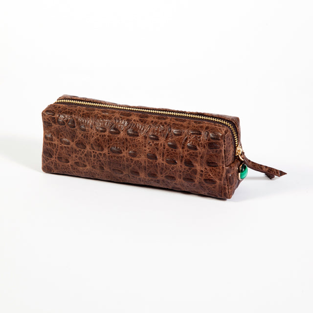 Oblong bag for pencils, make up or all your daily necessities, lined with our signature malachite lining.  100% Leather (Embossed Croco)  Natural Malachite stones, 24K gold plated setting