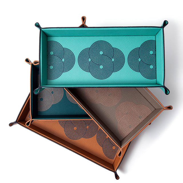 Vide poche trays meant to lighten up your load and give you joy wherever you choose to place them. Painted and handcrafted with love.  100% Leather