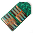 Madame Malachite A backgammon that you won't be able to leave home without!  In our signature envelope form, sealed with a malachite, our bestselling envelope backgammon is handcrafted with leather marquetry technique.  