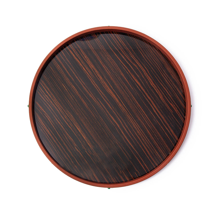 Madame Malachite Trays. Madame's mature midnight chicness in a tray...  use of ebony wood is highlighted in high-gloss with a leather border studded in signature malachite stone.