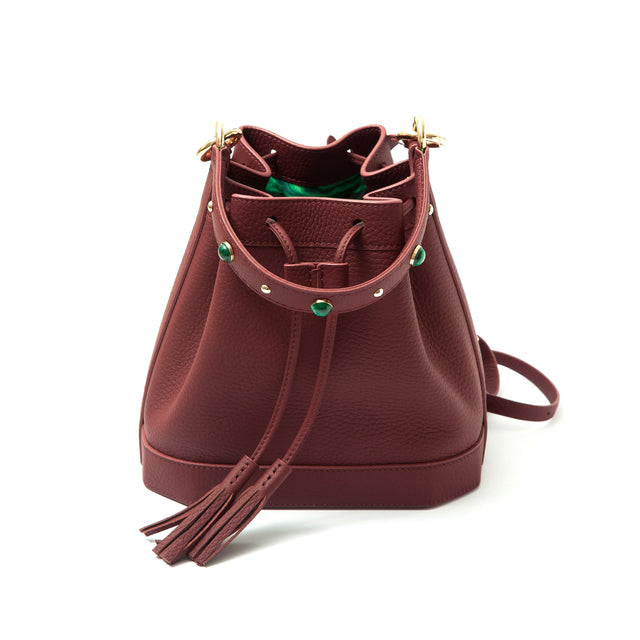 Madame Malachite Jeweled with malachite and agate stones, this bucket bag will help you catch those special moments.  100% Leather, natural malachite stone 