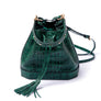 Madame Malachite Jeweled with malachite and agate stones, this bucket bag will help you catch those special moments.  100% Leather, natural malachite stone 