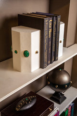 Madame Malachite A powerful protection stone, Black Onyx absorbs and transforms negative energy, wherever you may choose to keep it.  Timeless and tasteful bookends jeweled with natural stones to increase the energy in you home.  Perfect decorative pieces for for your cabinet of curiosities.  %100 Leather (Floater leather) 