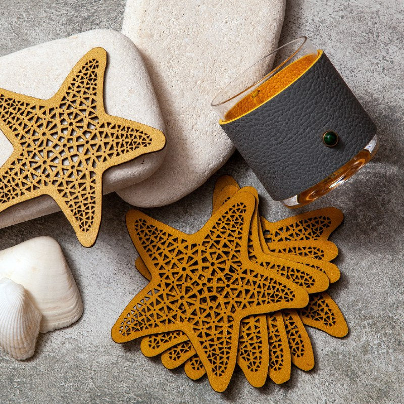 Madame Malachite Starfish Coasters A set of 6 coasters,    100% vegetable-tanned leather  Jeweled with natural malachite stone