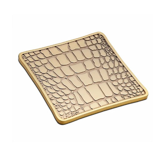 Meticulously handcrafted in antiqued brass, L'OBJET Crocodile Coasters are rich in natural texture and global in design  4 L x 4 W in (10 D cm) Presented in a luxury gift box Set of 4 Brass