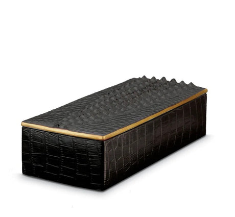 Meticulously handcrafted from porcelain with 24K gold, our Crocodile Rectangular Box completes a whimsical desktop collection that is complex in color, rich in texture and global in design.  9 L x 4 W x 2.5 H in (23 L x 10 W x 7 H cm) Presented in a luxury gift box Fine Porcelain, 24k Gold L'OBJET