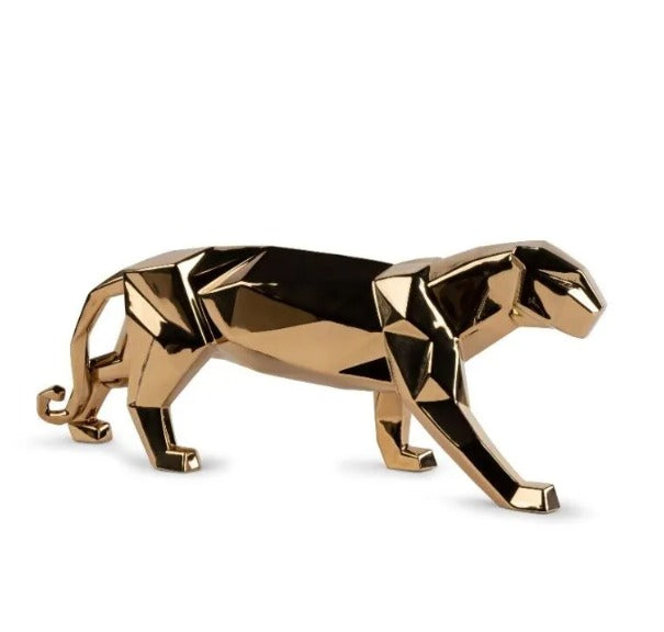Lladro Panther Porcelain creation in spired by a panther from the Origami collection. Sculptor Marco Antonio Noguerón The Origami collection is adding a new version of Panther, now with an elegant golden metallic finish. Like the rest of the pieces in this collection, it is a contemporary innovative reinterpretation of the traditional Japanese art of origami, 