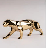 Lladro Panther Porcelain creation in spired by a panther from the Origami collection. Sculptor Marco Antonio Noguerón The Origami collection is adding a new version of Panther, now with an elegant golden metallic finish. Like the rest of the pieces in this collection, it is a contemporary innovative reinterpretation of the traditional Japanese art of origami, 