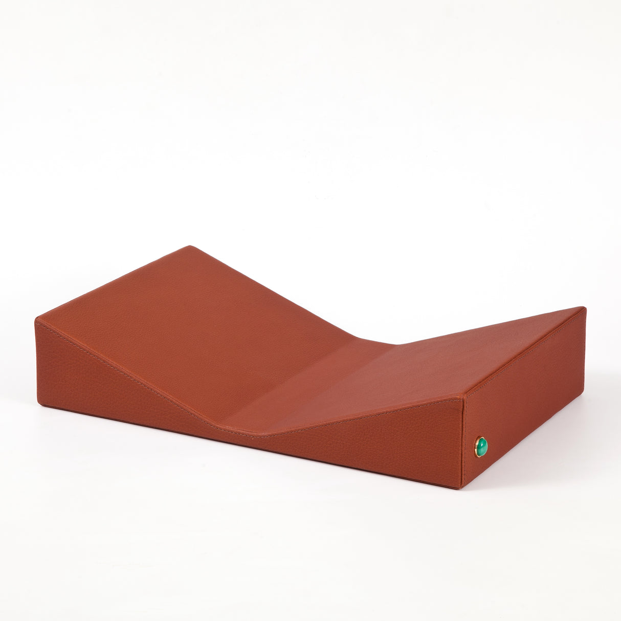 Functional, yet sculptural. Display your favorite book front and center.  %100 Floater Leather, Natural Malachite