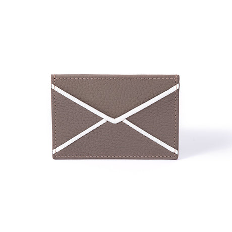 Madame Malachite  signature envelope credit card holders.   Pair it with our mini envelopes to use as a wallet.    Lined with our signature malachite fabric, these are the perfect way to add color to your life.  100% Leather  Handcrafted with love