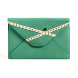 Madame Malachite The Crossroads envelope is the perfect talisman for you to carry everywhere you go. You will be surprised how much you can fit into this beautiful envelope clutch.  100% Leather (Cork & Leather combination is also available)  Handcrafted with love, jeweled with natural malachite stone.