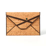 The Crossroads envelope is the perfect talisman for you to carry everywhere you go. You will be surprised how much you can fit into this beautiful envelope clutch.  100% Leather (Cork & Leather combination is also available)  Handcrafted with love, jeweled with natural malachite stone.