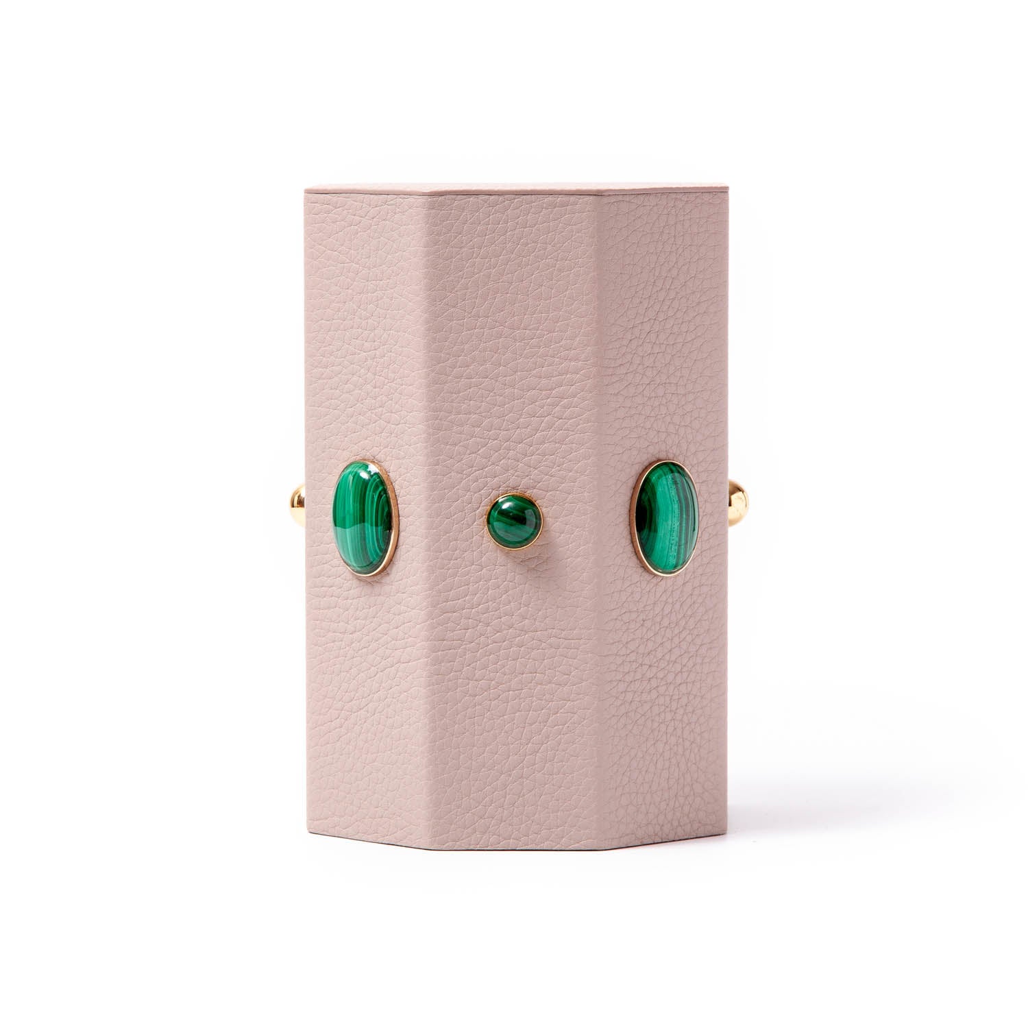 Madame Malachite A powerful protection stone, Black Onyx absorbs and transforms negative energy, wherever you may choose to keep it.  Timeless and tasteful bookends jeweled with natural stones to increase the energy in you home.  Perfect decorative pieces for for your cabinet of curiosities.  %100 Leather (Floater leather) 