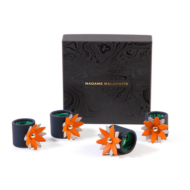 Blooming flowers in leather,  jewels for your tabletop...  Sold as a box of 4, lined with malachite lining.